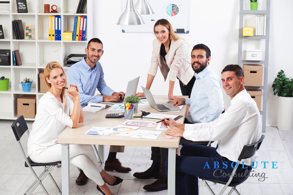 Group Of Business People Having Meeting In Office